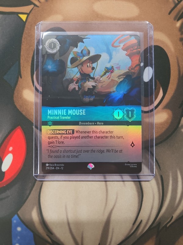 Minnie Mouse – Practical Traveler (Epic) 219/204 Wilds Unknown Holo