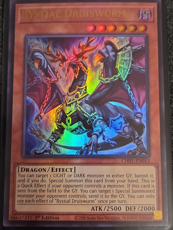 1X NM Bystial Druiswurm – CH01-EN013 – Ultra Rare 1st Edition