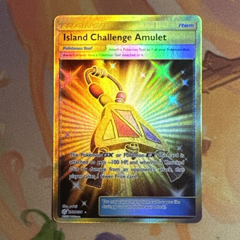 Island Challenge Amulet (Secret) 265/236 Sm-Cosmic Eclipse Holo