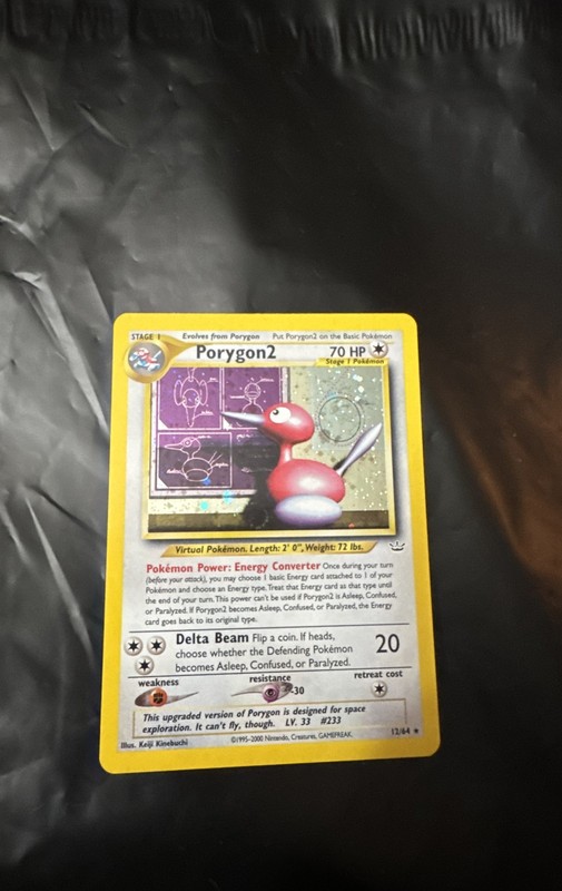 Por 12/64 Neo Revelation Holo