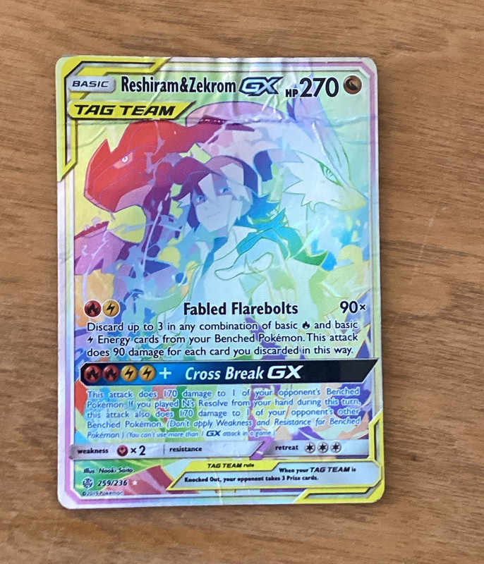 Reshiram & Zekrom GX Secret Holo Rainbow Rare 259/236 SM Cosmic Eclipse