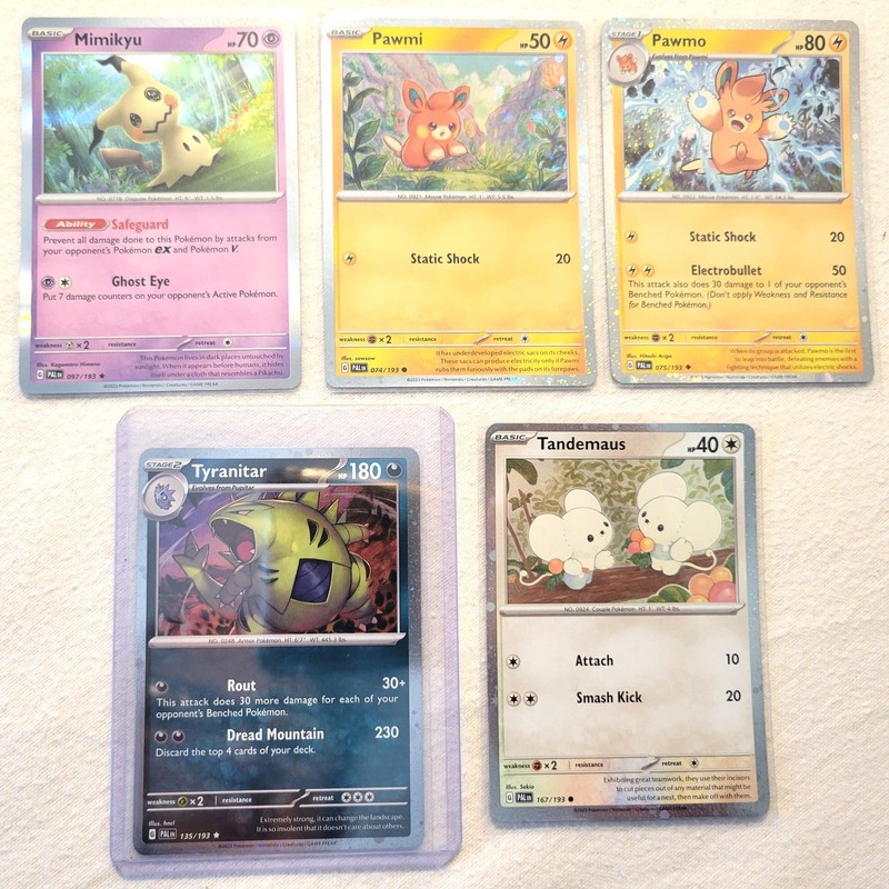 Paldean Winds Combo 5 cards: Mimikyu, Pawmi, Pawmo, Tandemus and Tyranitar