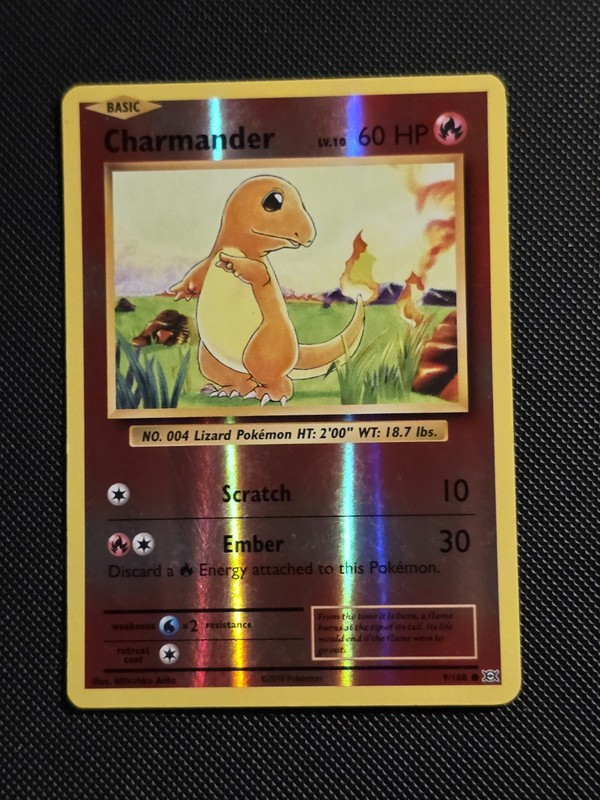 Charmander 9/108 Evolutions Reverse Holo