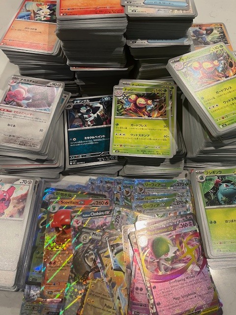 1101 streamer bulk Asian Pokemon cards with 100 holos & 1 EX or better