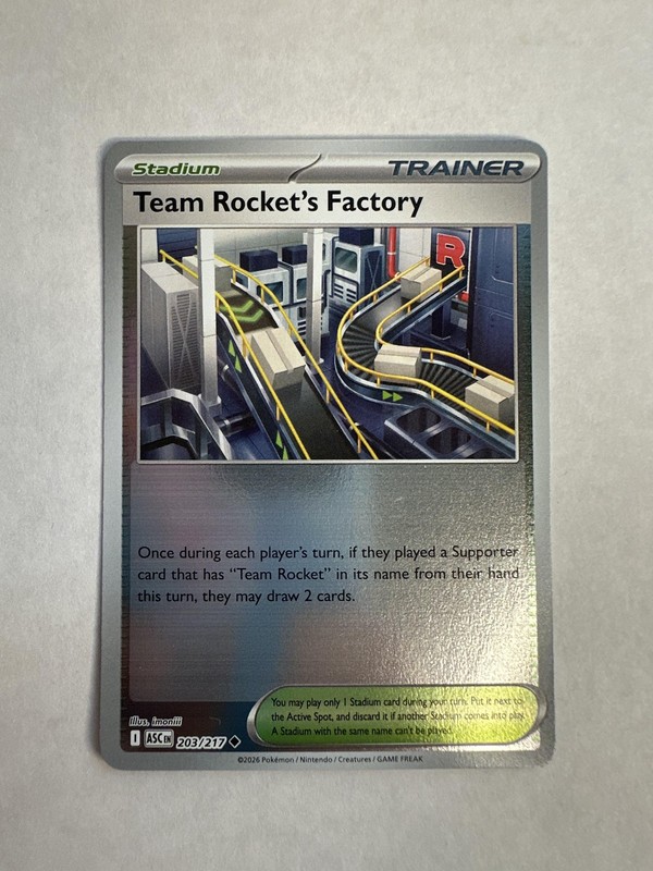 ME: Ascended Heroes #203/217 Team Rocket’s Factory Reverse Holo