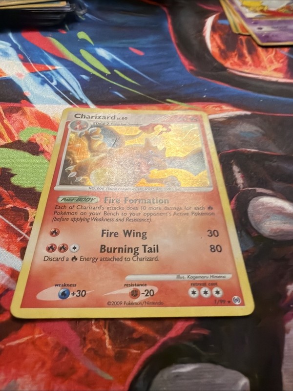 Pokémon TCG Arceus Charizard 1/99 Cracked Ice Holo Rare gallery