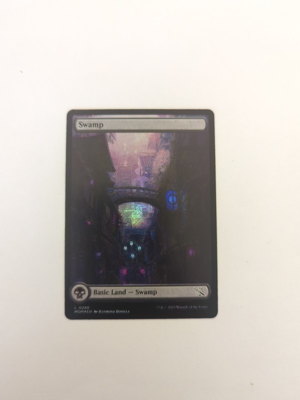 Swamp (0286) *FOIL* March of the Machine NM MTG