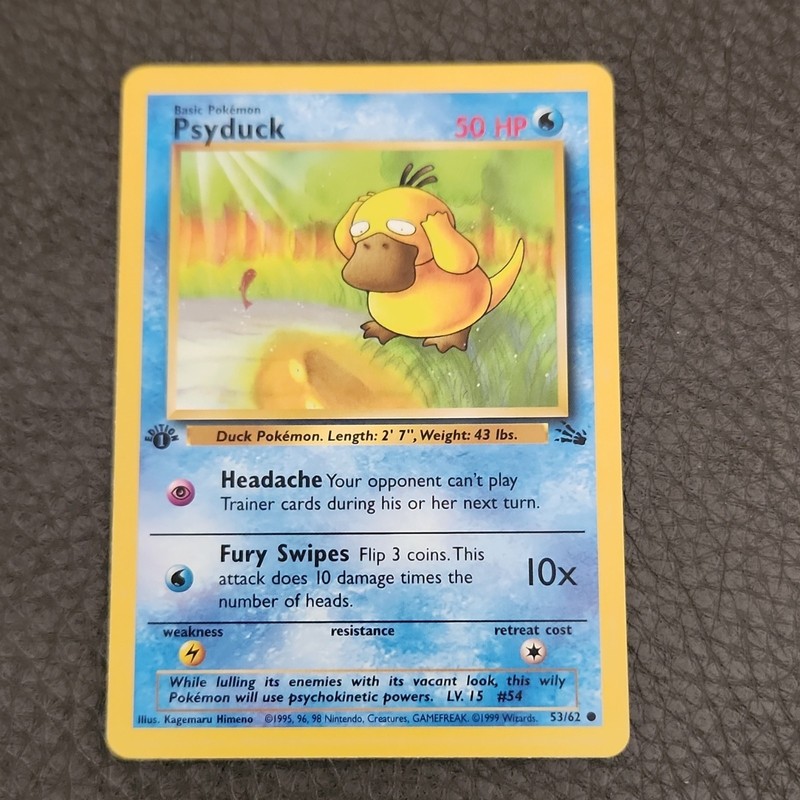 Pokémon Psyduck 53/62 Fossil 1st Edition Regular Common Card English Near Mint