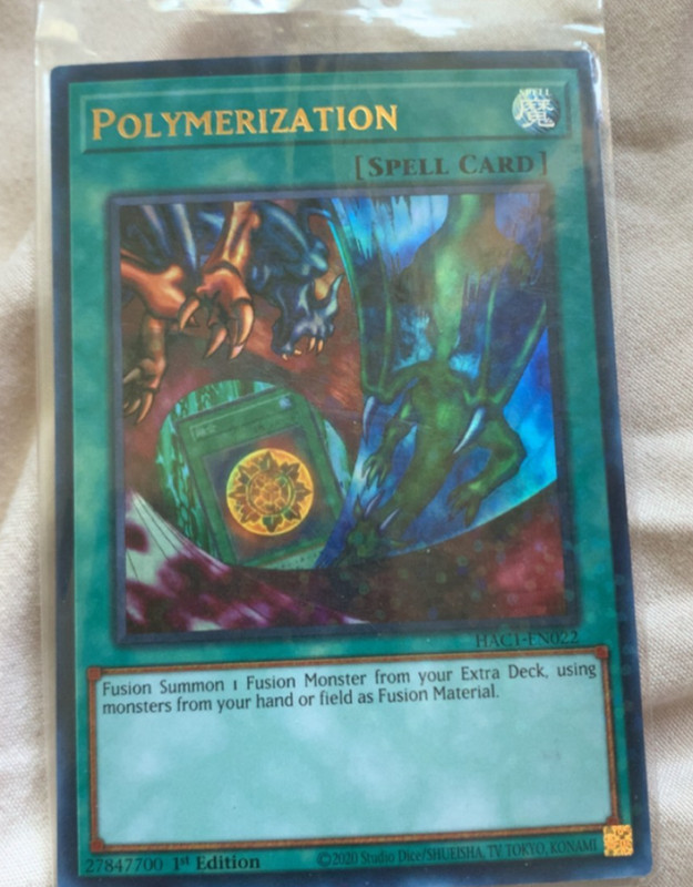 Polymerization-HAC1-EN022-Ultra Rare (UR) Shatterfoil-1st Edition-2020