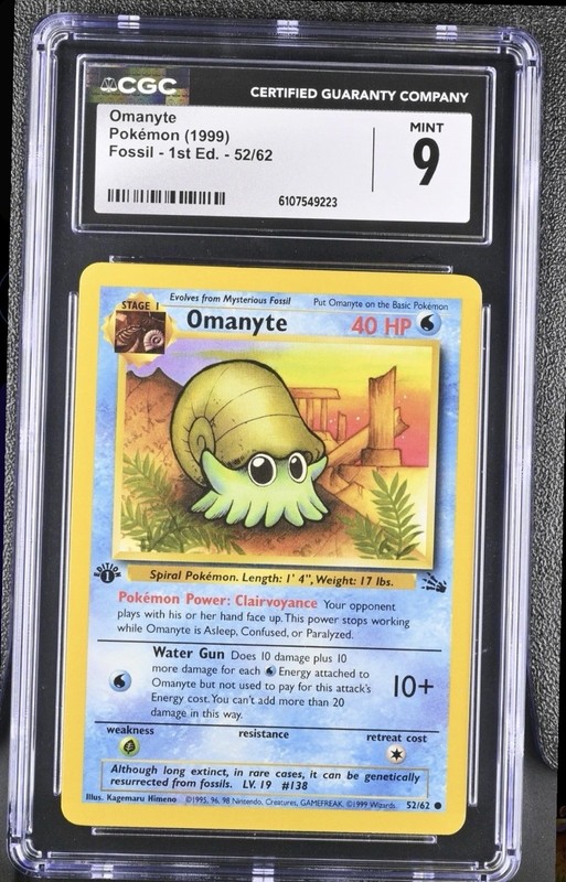 CGC 9 MINT Omanyte 1999 Fossil 1st Edition 52/62 Pokemon Card