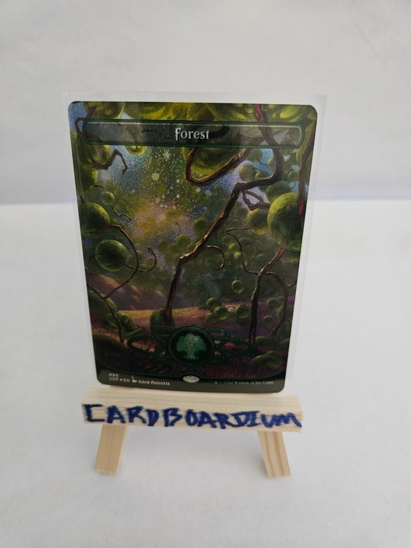Magic the Gathering – Forest (490) (Borderless) (Galaxy Foil) Unfinity Foil