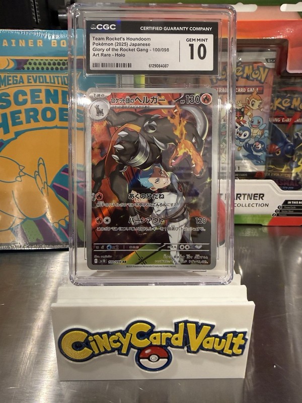 The Pokémon Company Team Rocket’s Houndoom 100/098 SV10 AR Holo JP 2025 CGC 10